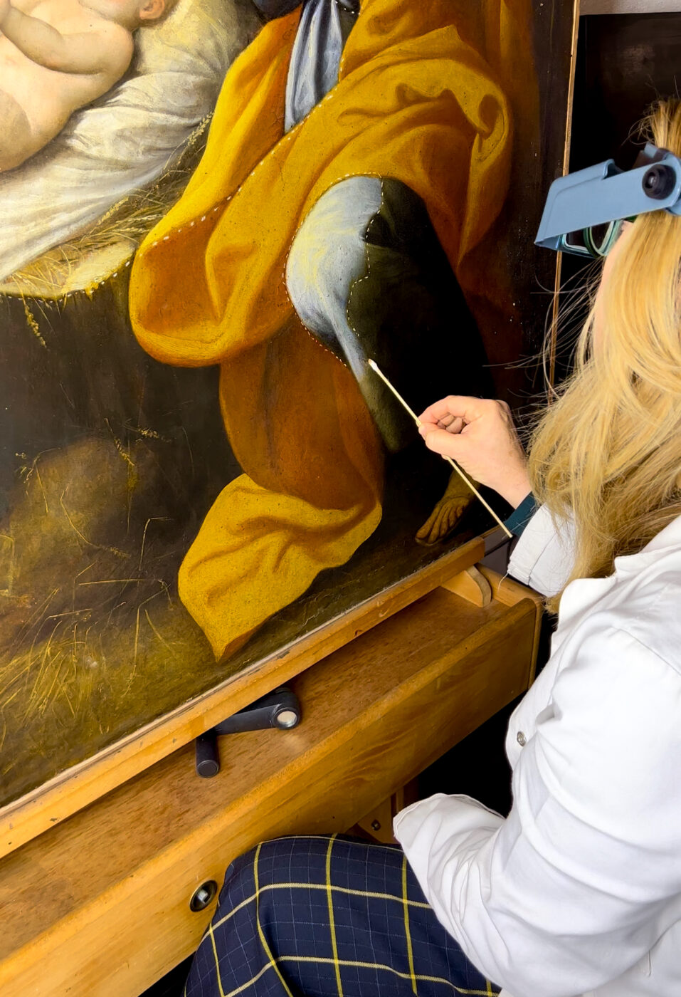 restoration work on a painting