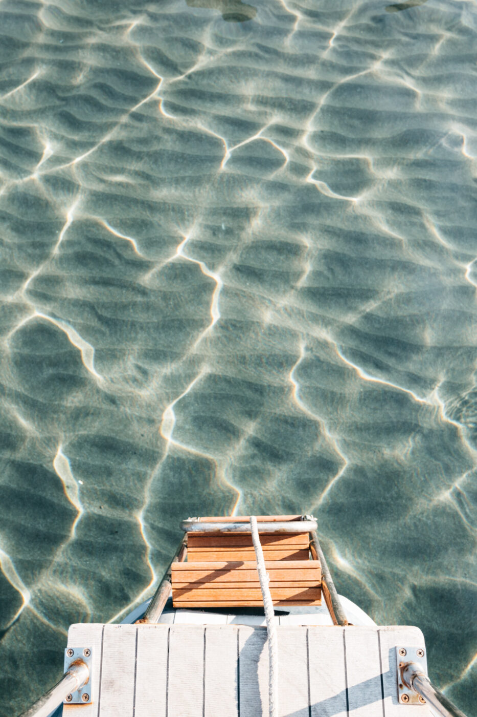 steps down into the sea with sunlight reflecting on it at Forte San Giorgio