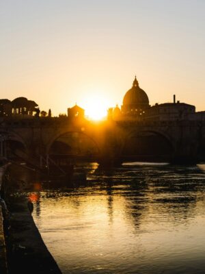 sunset in Rome over the Vatican captured on the Tiber river