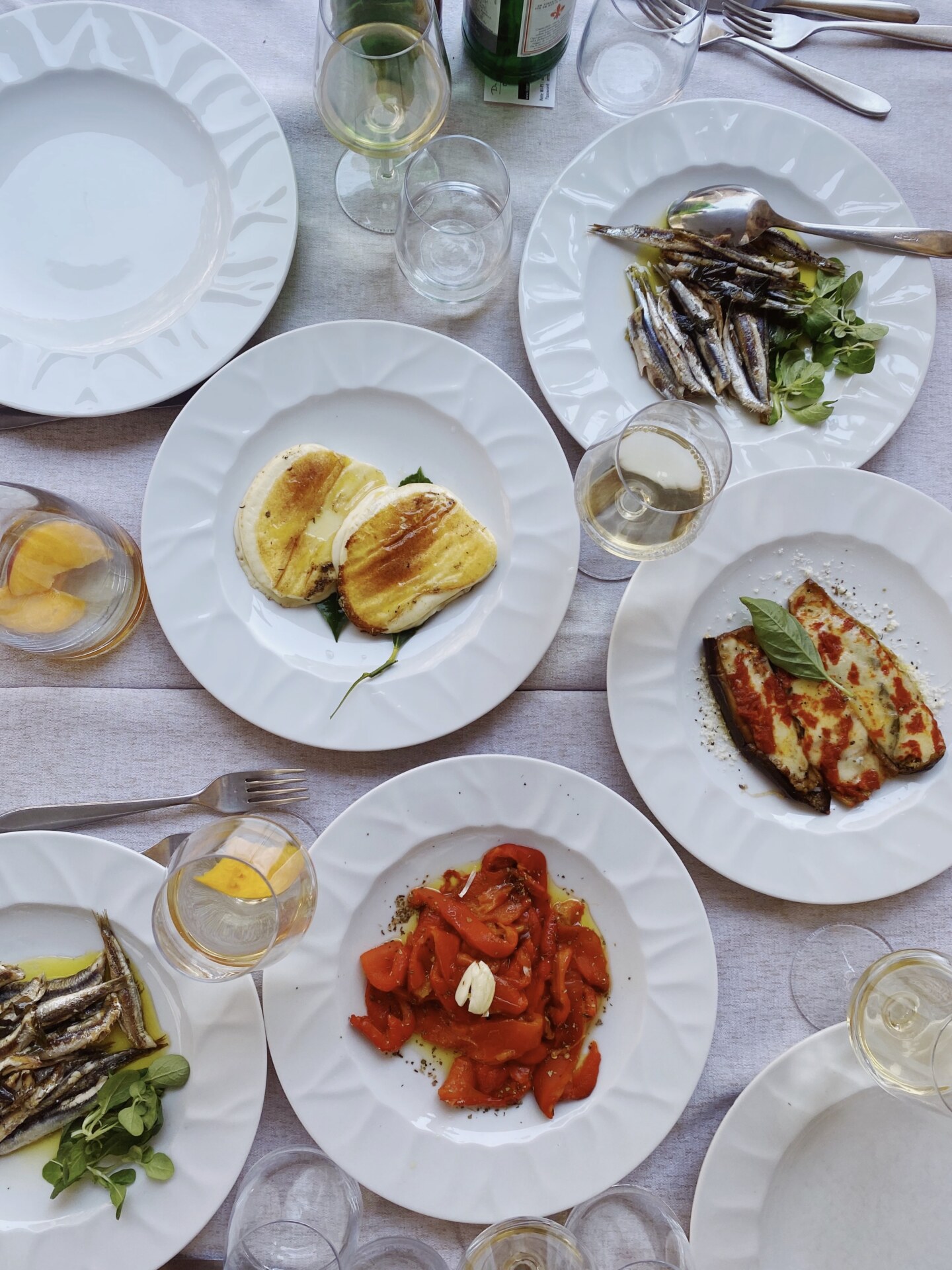 tables from above with different types of appetizers at Da Armandino
