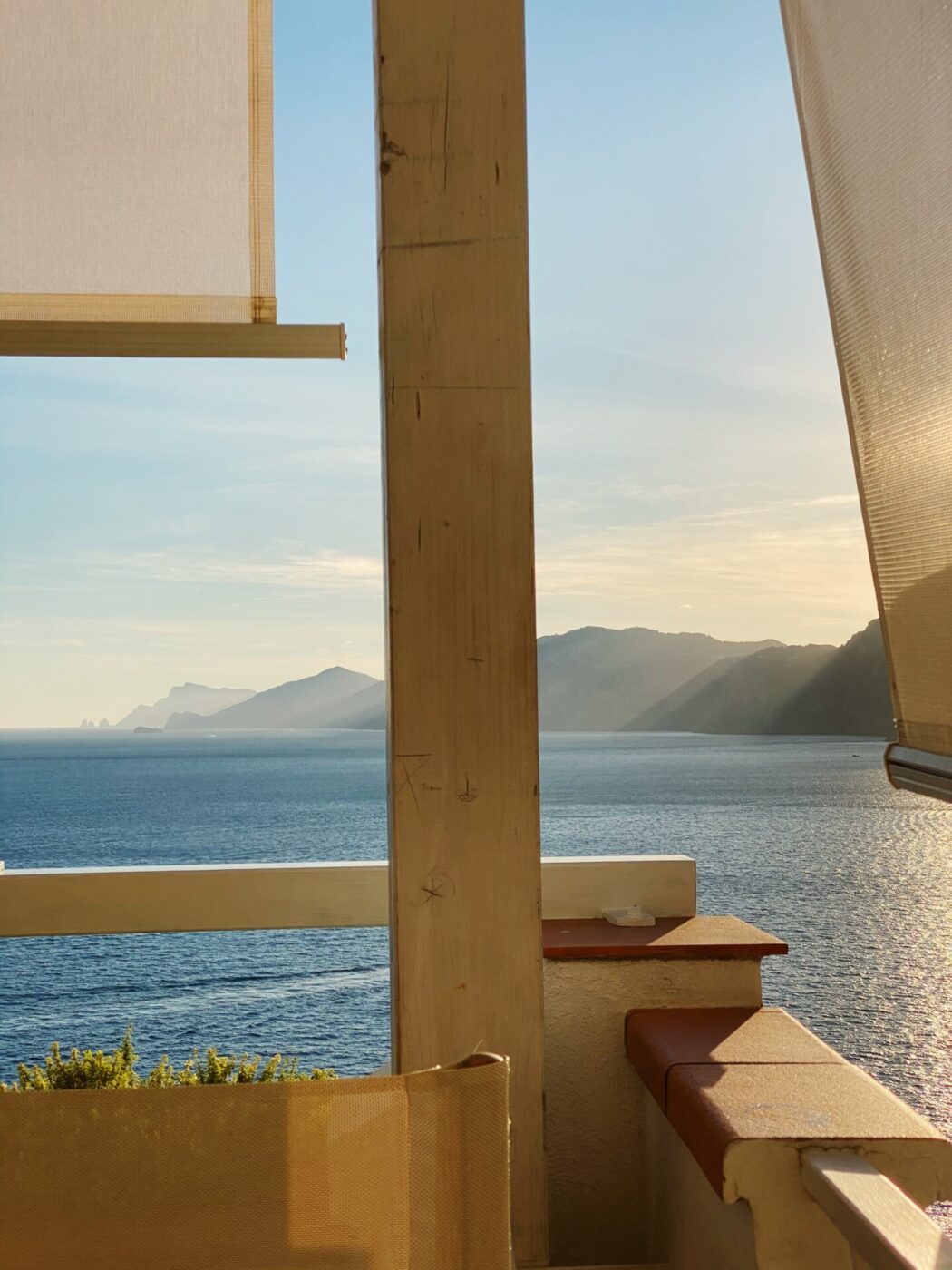 a table overlooking the sea on the amalfi coast