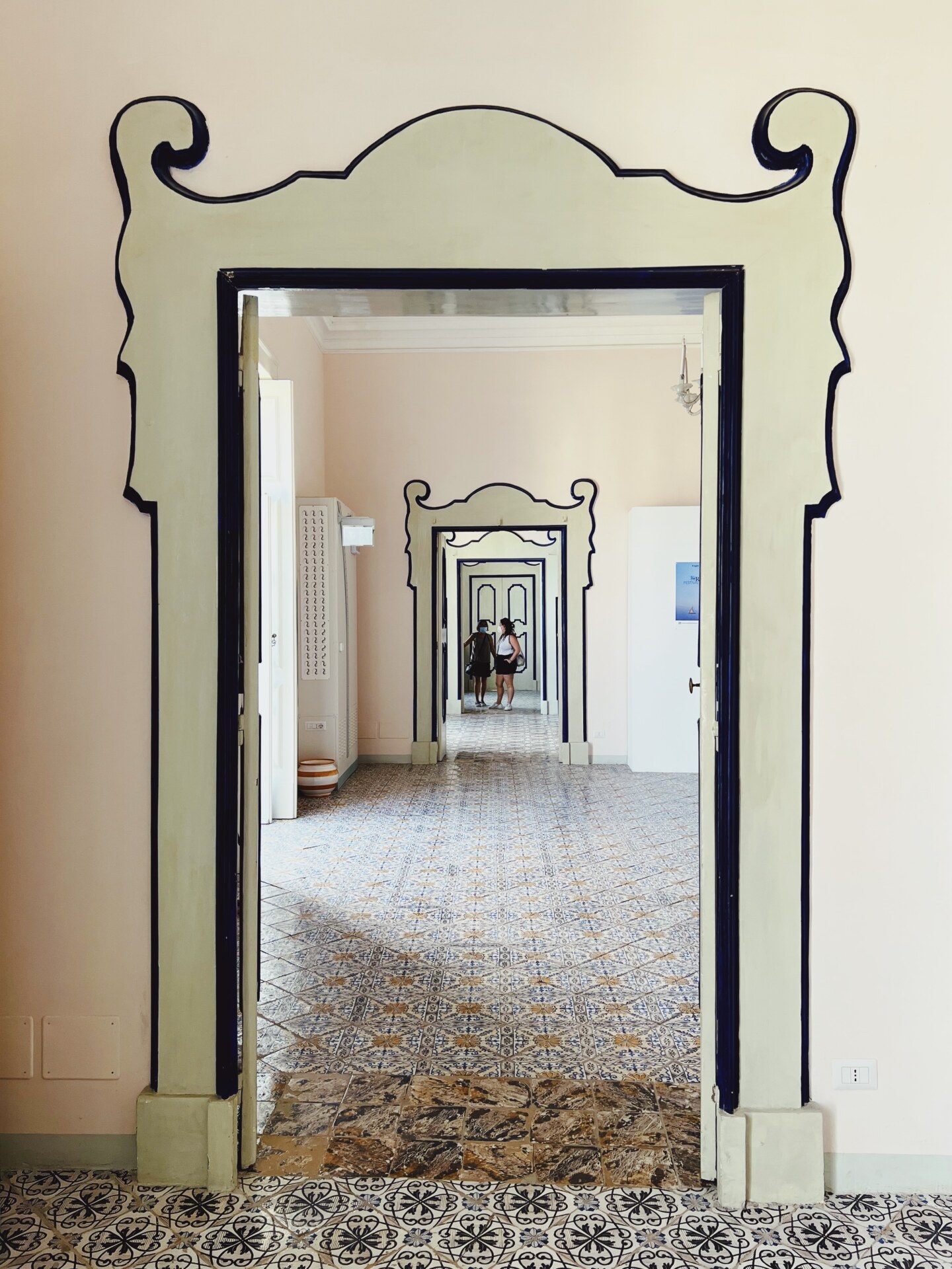 looking through multiple similar doors at Villa Rufolo