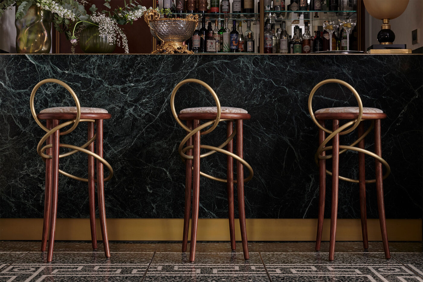 three beautiful bar chairs at the bar at violino d'oro