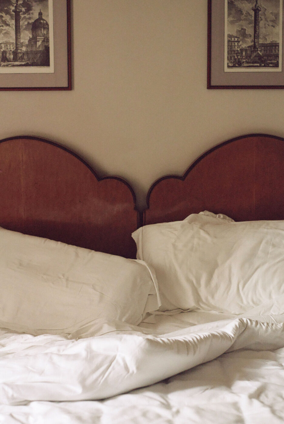 an image of wooden bedframes at Hotel Locarno
