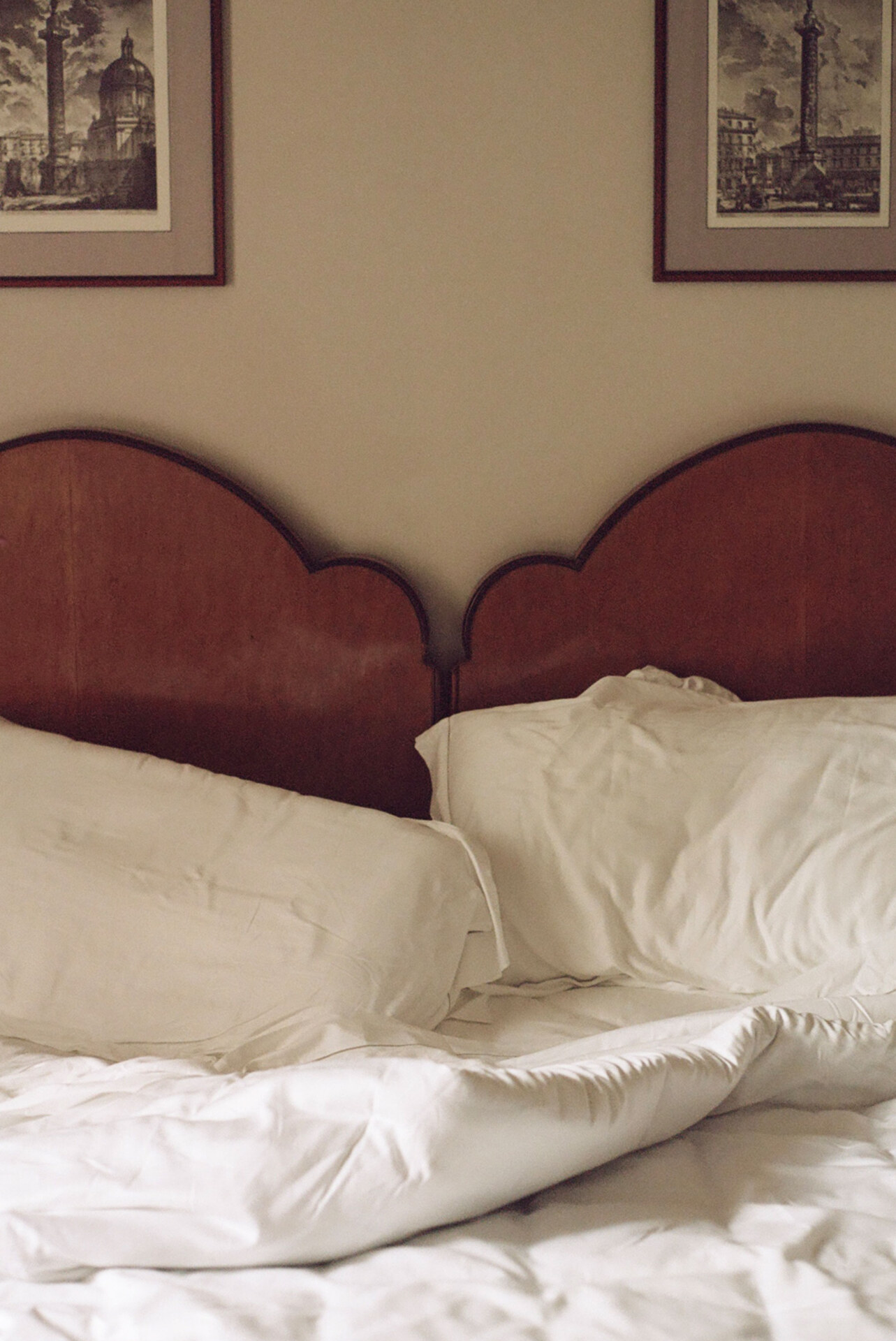 an image of wooden bedframes at Hotel Locarno