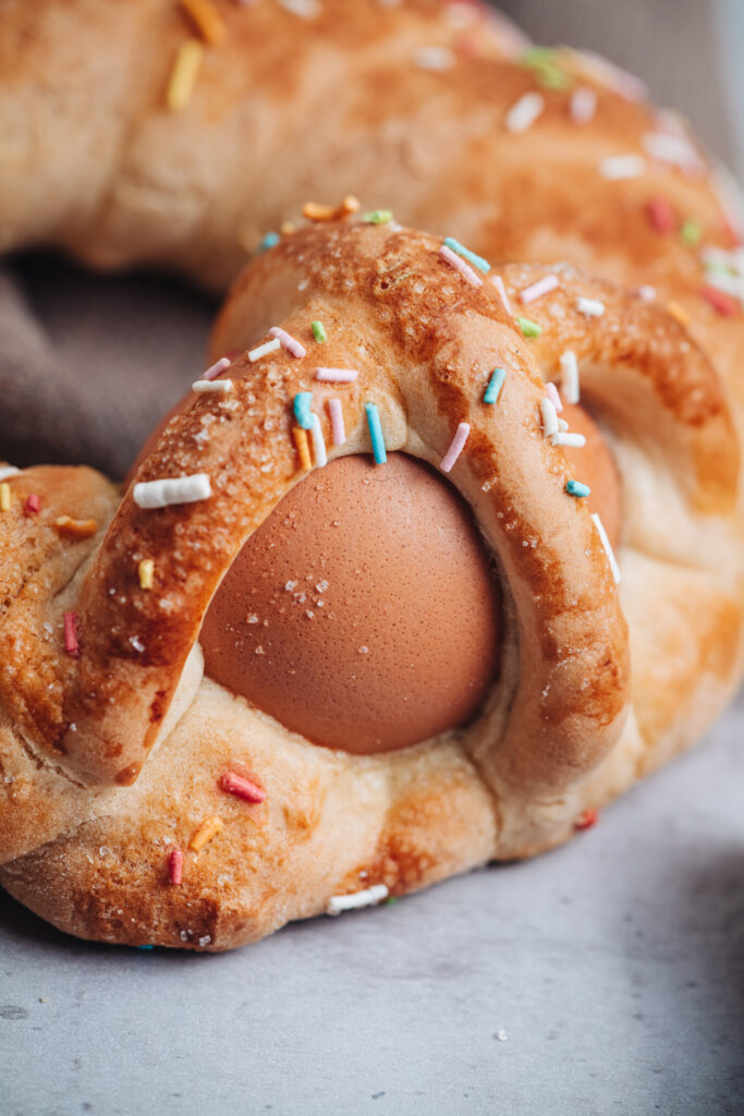 an image of the Scarella bread from Puglia with a hard boiled egg encased by two pieces of dough on top