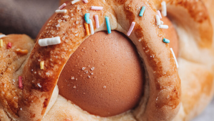 an image of the Scarella bread from Puglia with a hard boiled egg encased by two pieces of dough on top