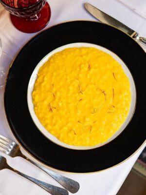 an overhead image of Risotto alla milanese from Giacomo Milano