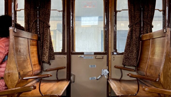 an image aboard the vintage, wooden Treno di Dante