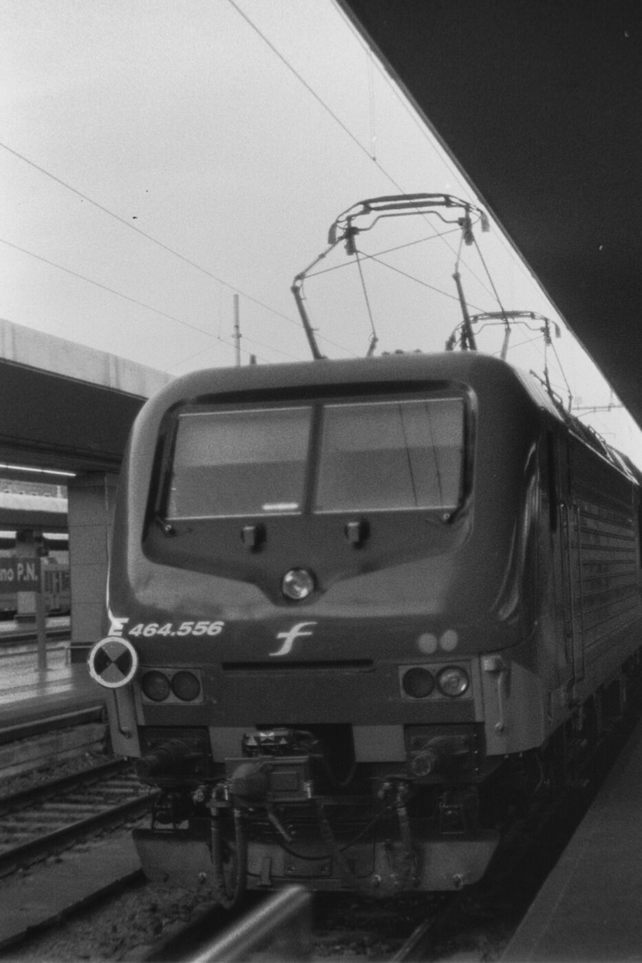 a black and white image of a regional train in Italy