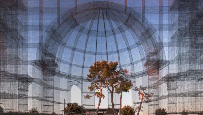 the Basilica di Siponto made of wire and mesh photographed from the inside looking out and you can see trees through it