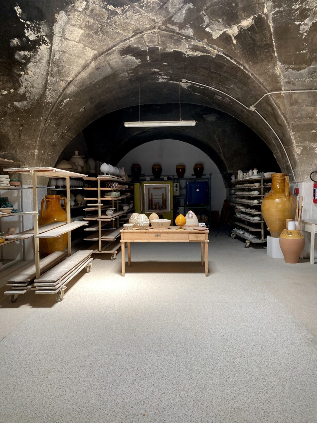 a room in Grottaglie filled with ceramics