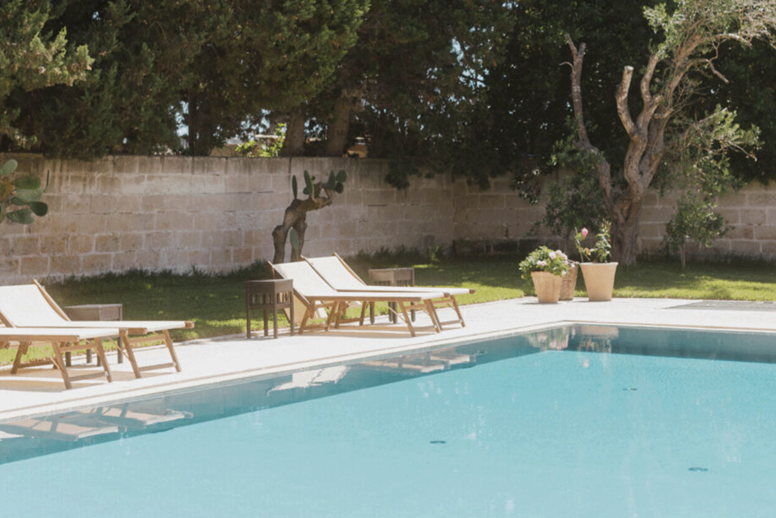 an image of the clear blue pool at Masseria Montelauro