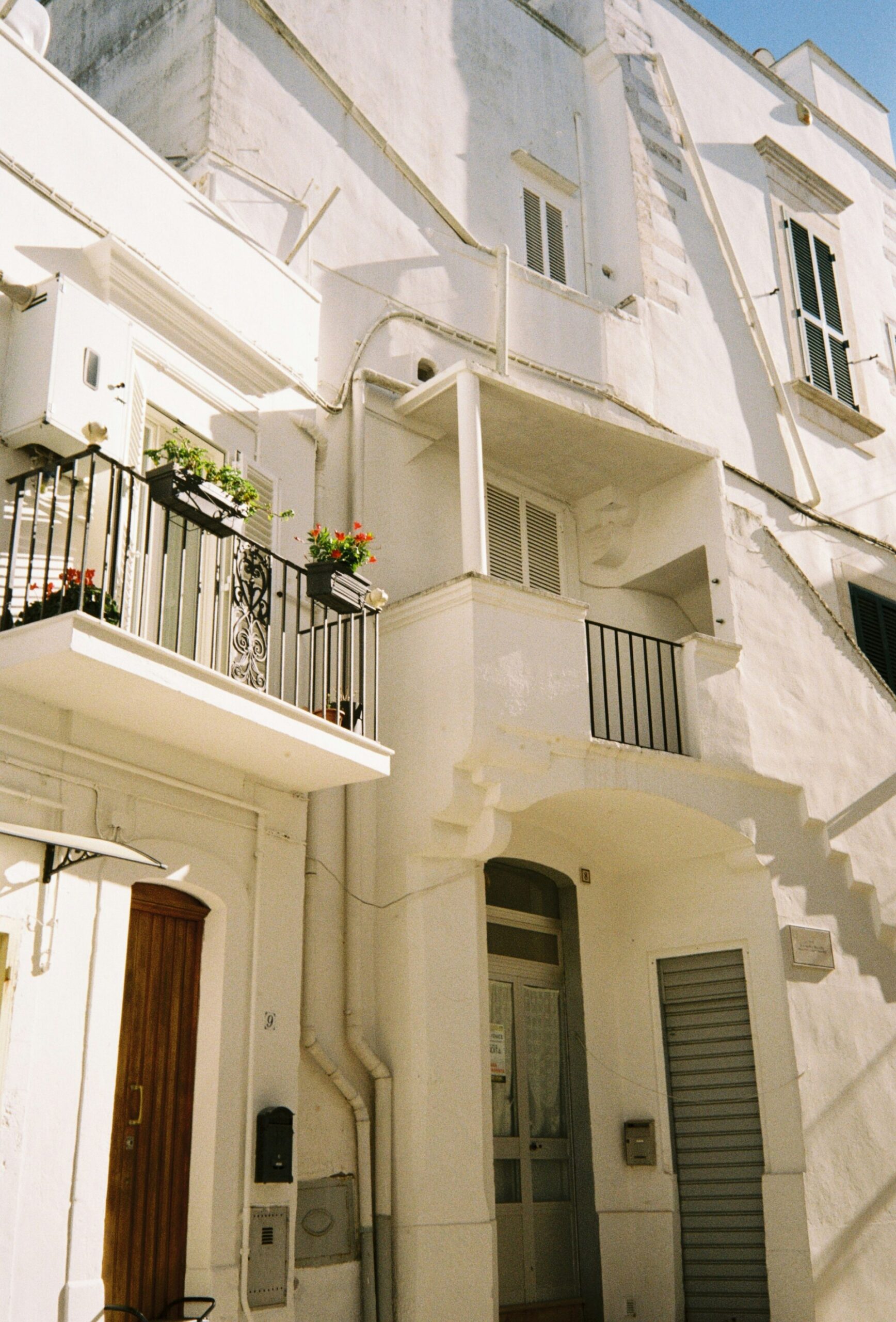 bright white balconies and homes in Martina Franca