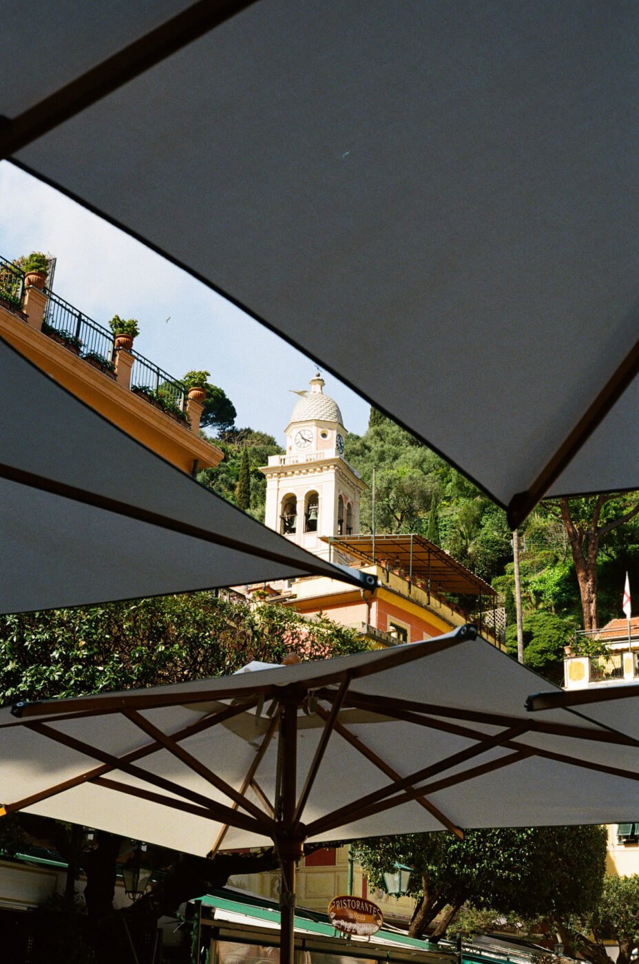 an image of umbrellas in portofino outside a gelateria