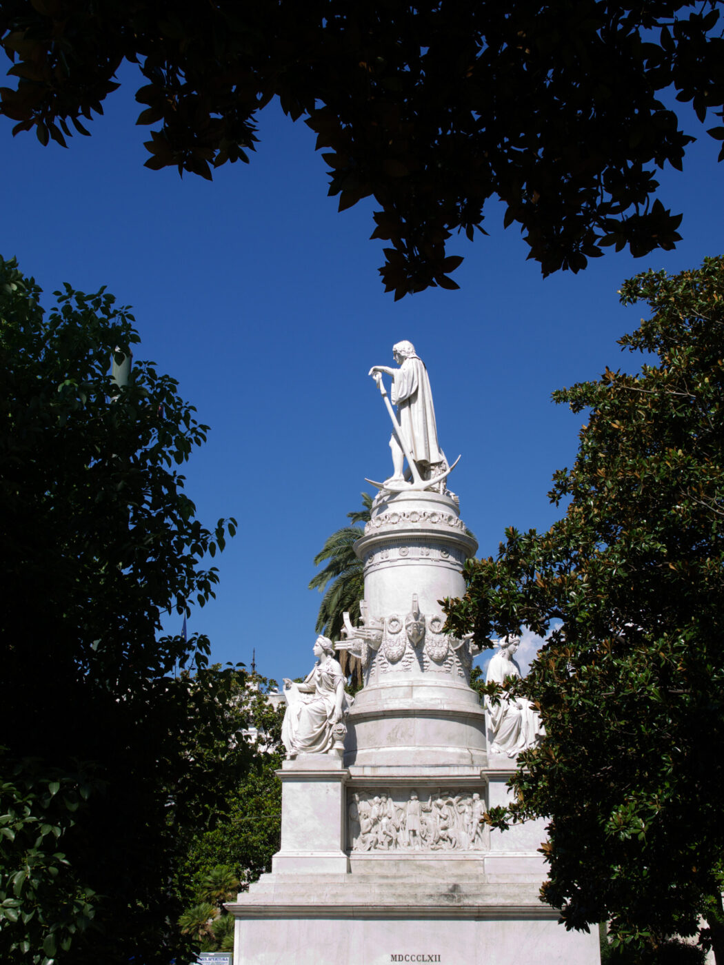 the statue of Christopher Columbus in Genova photographed from the side