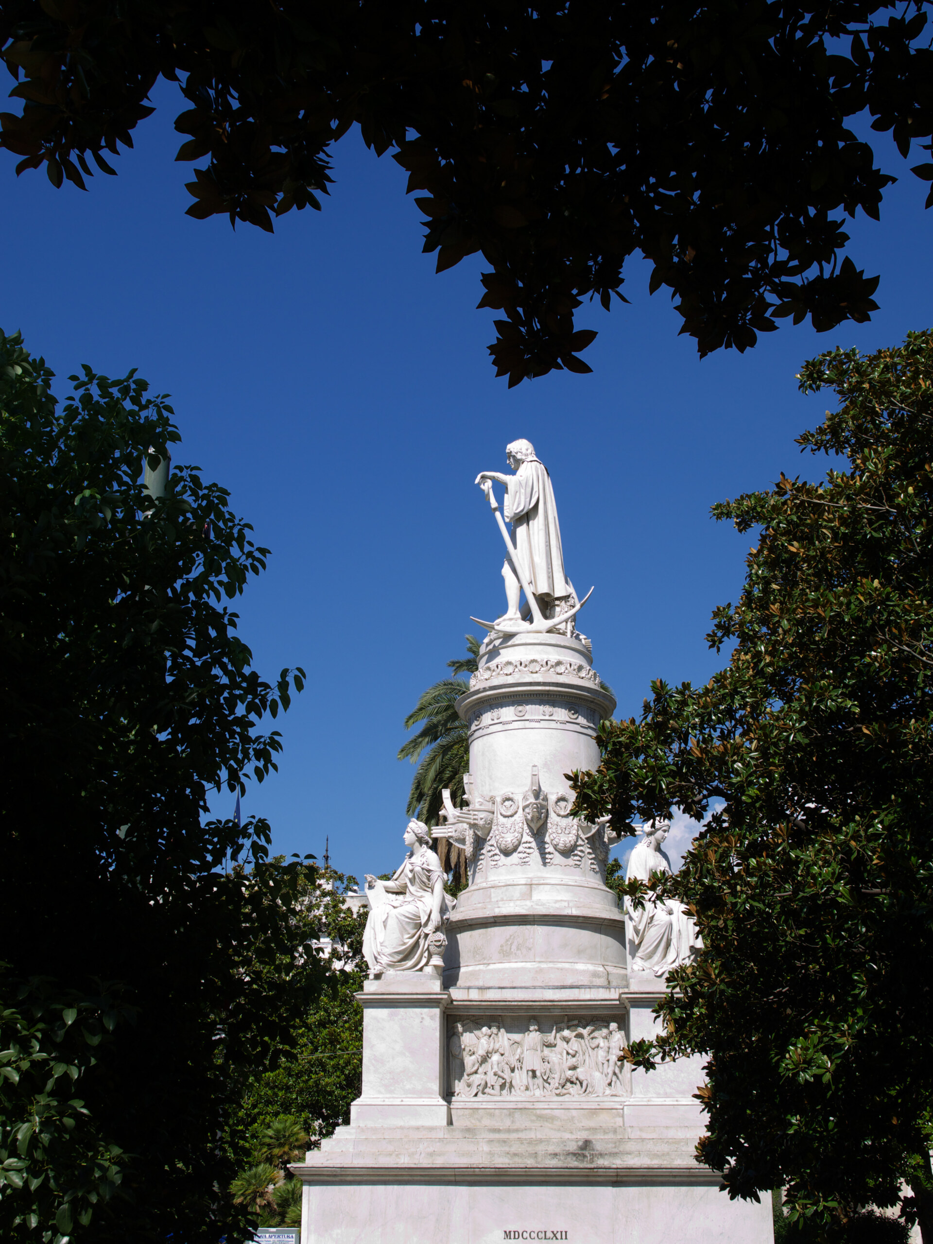 the statue of Christopher Columbus in Genova photographed from the side