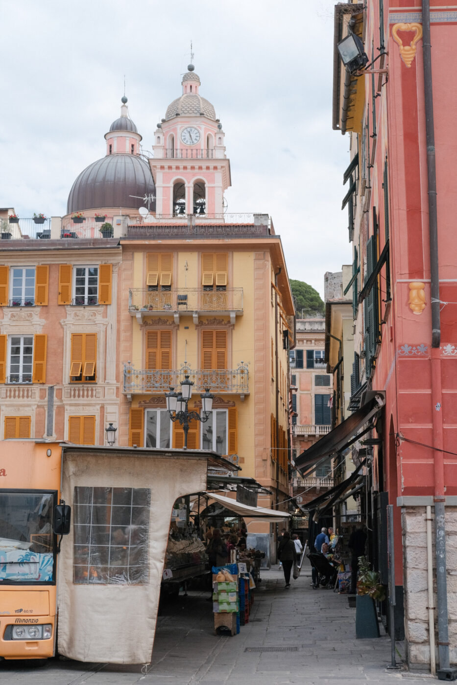 an image of a few small stalls selling fruits and veggies in Chiavari