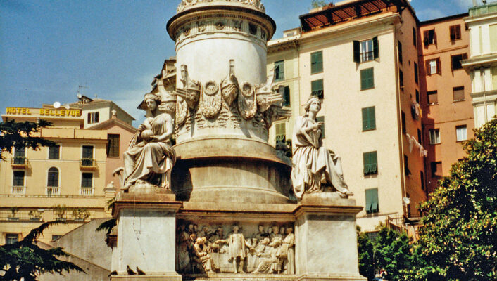 a film photo of the statue of Christopher Columbus in Genova