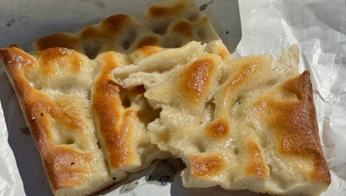 an image of two golden pieces of focaccia genovese