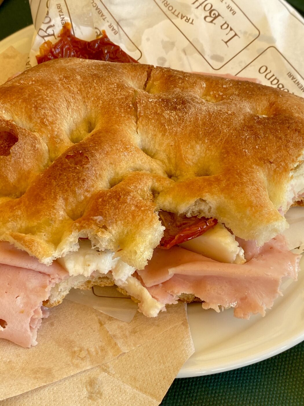 an image of a Schiacciata sandwich with prosciutto