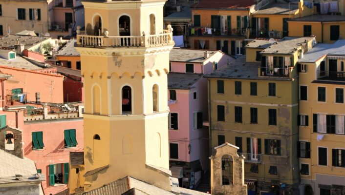 an image of a town in Cinque Terre photographed looking out towards the sea