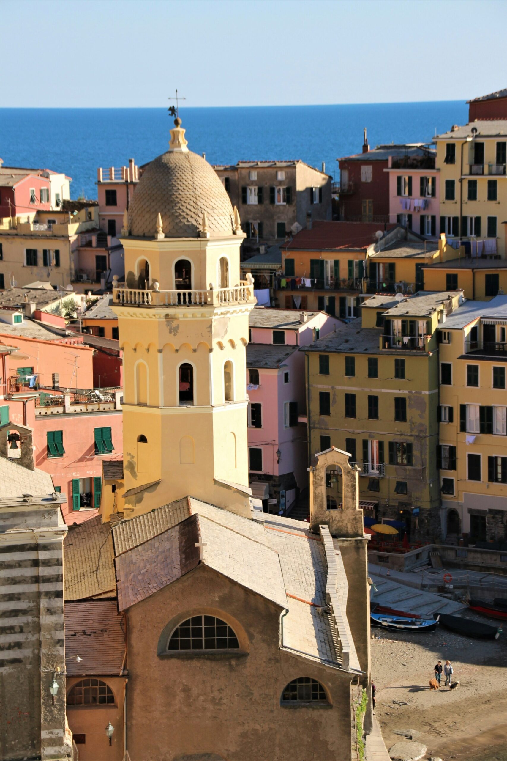 an image of a town in Cinque Terre photographed looking out towards the sea