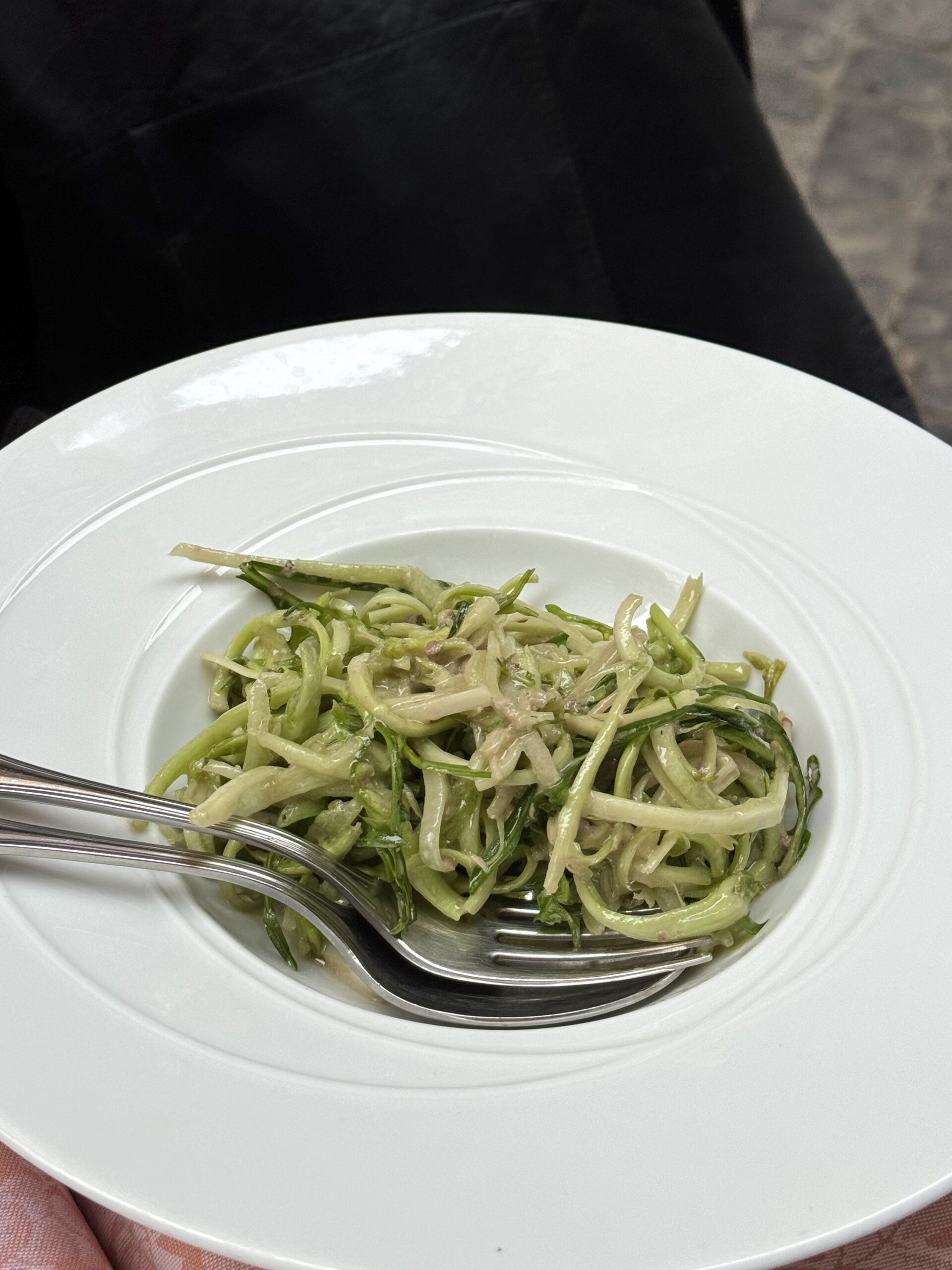an image of puntarelle covered in an anchovy dressing