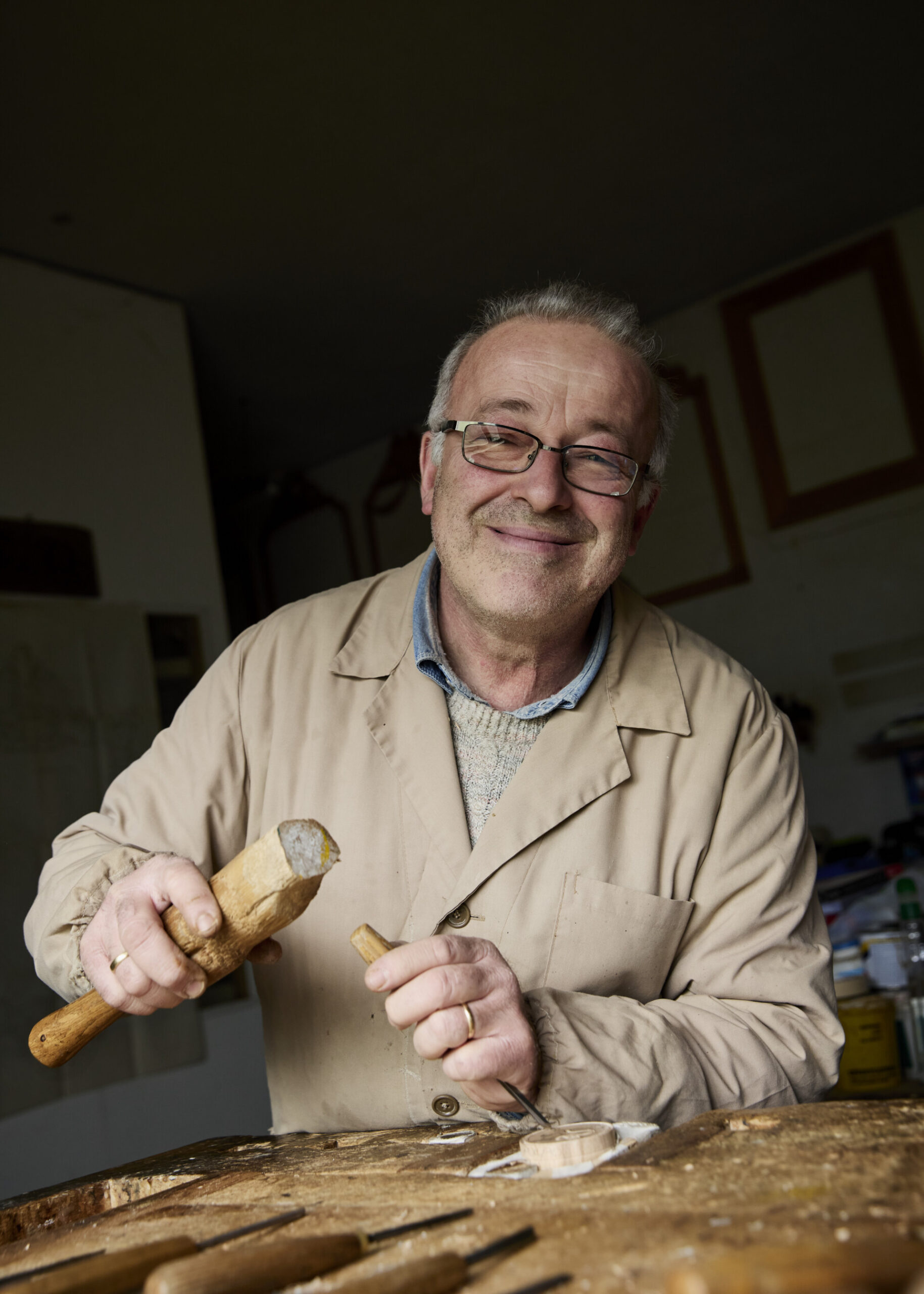 Filippo Romagnoli hand carving a stamp for corzetti pasta