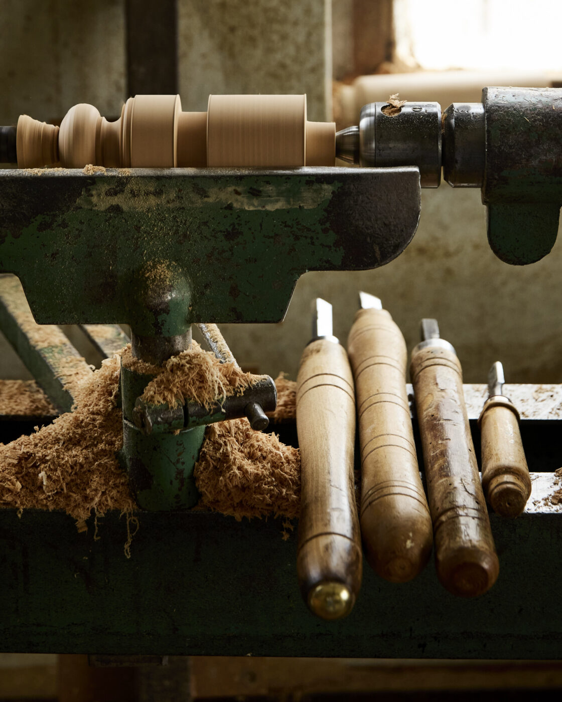 an image of wood working and shaving to make corzetti pasta stamps