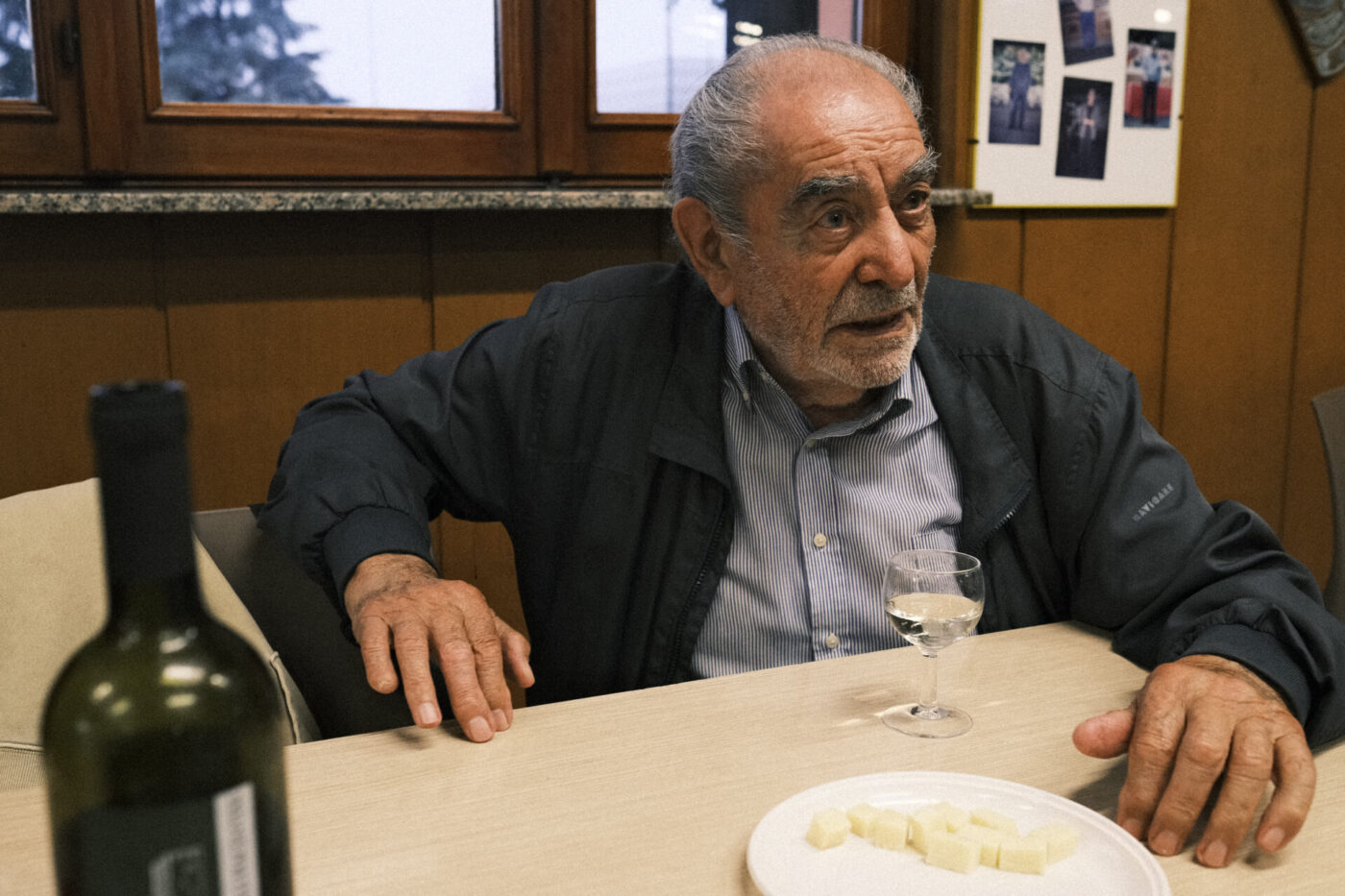 Gianni at the cooperative with wine and cheese