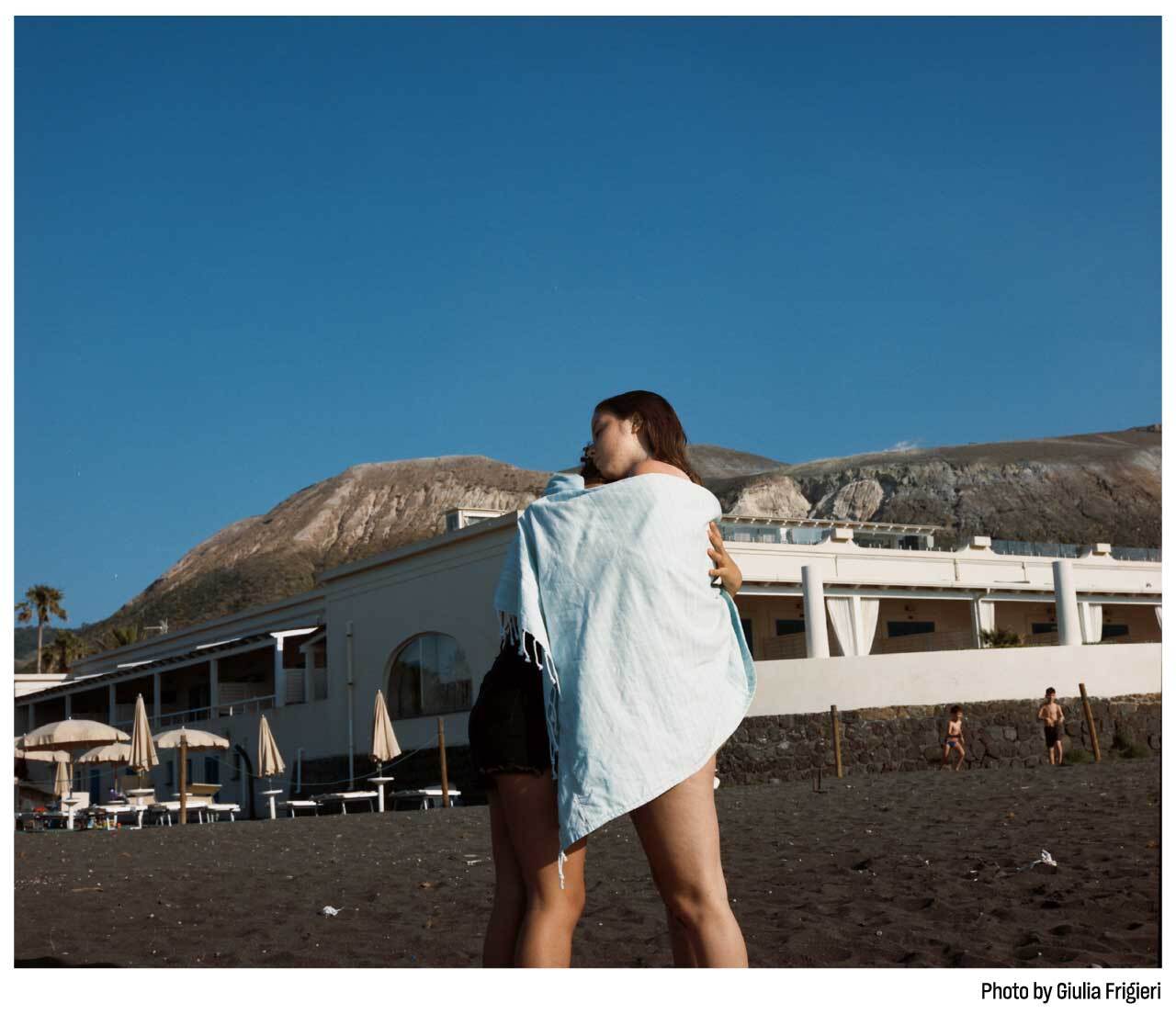 an image of two girls hugging in the Aeolian islands