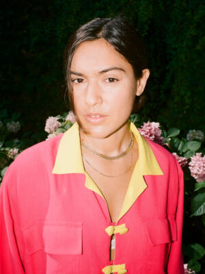 An image of Pia Zanardi wearing a hot pink shirt