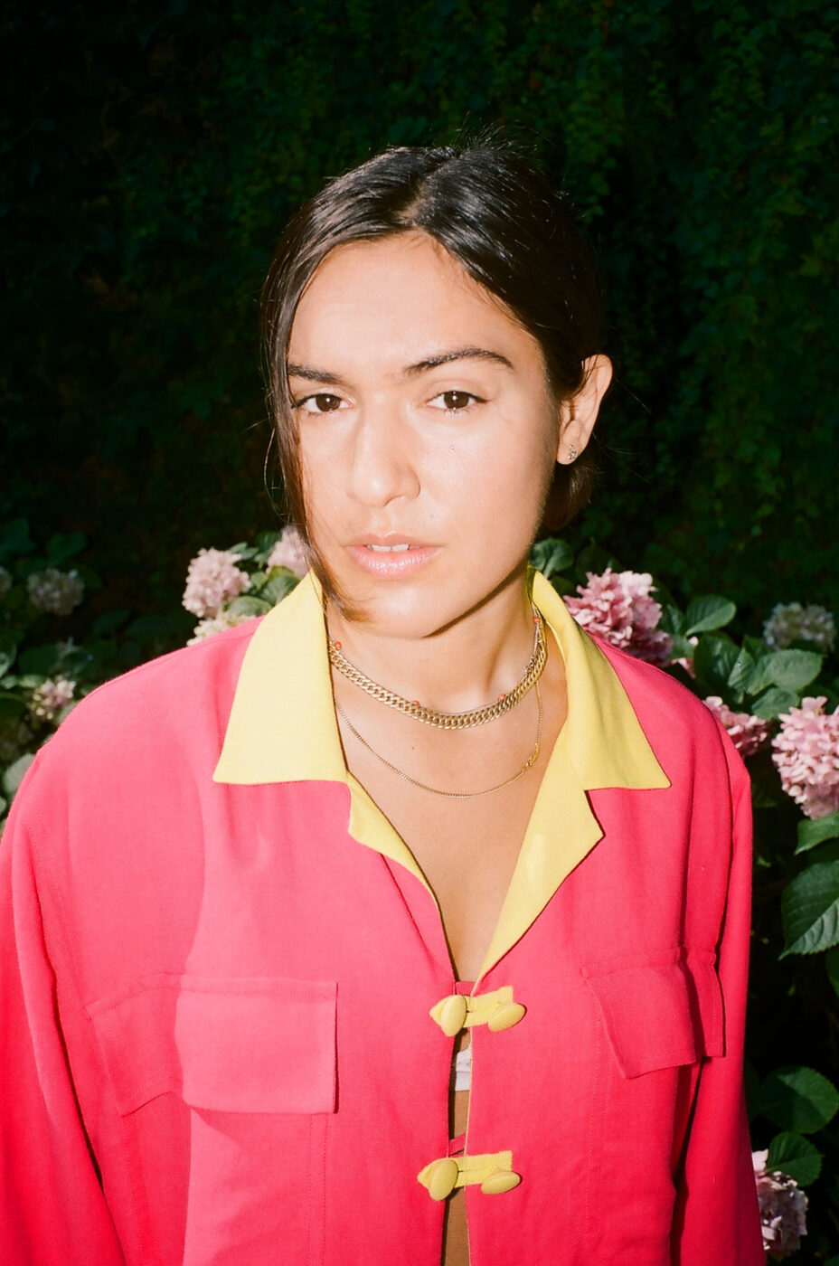 An image of Pia Zanardi wearing a hot pink shirt
