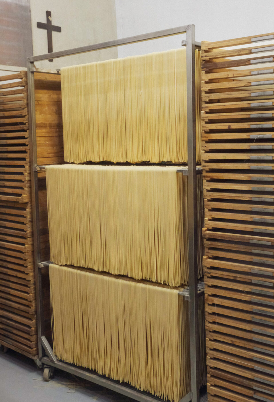 multiple carts of tirrena spaghetti air drying