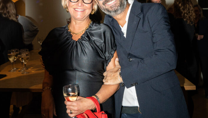 Maj-la and claudio pizzelli of atp atelier hugging at an event