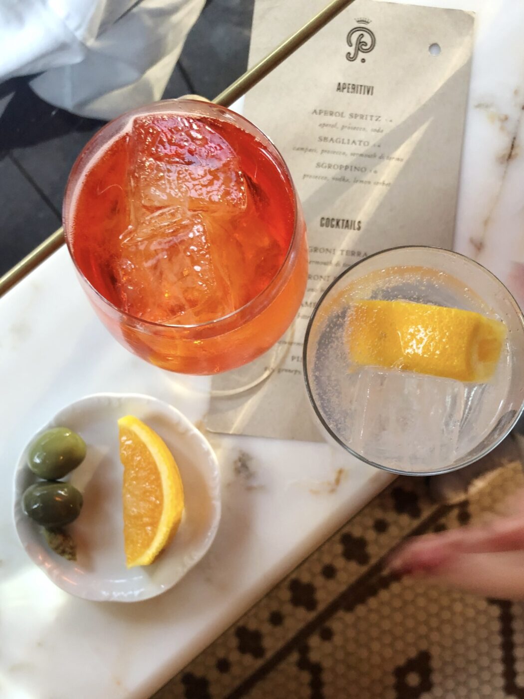 an overhead image of aperitivo at bar pisellino