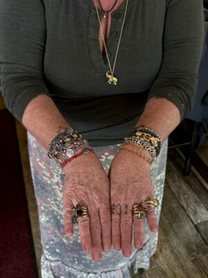 the ring-covered hands of Beatrice Tosti of Il Posto Accanto in NYC