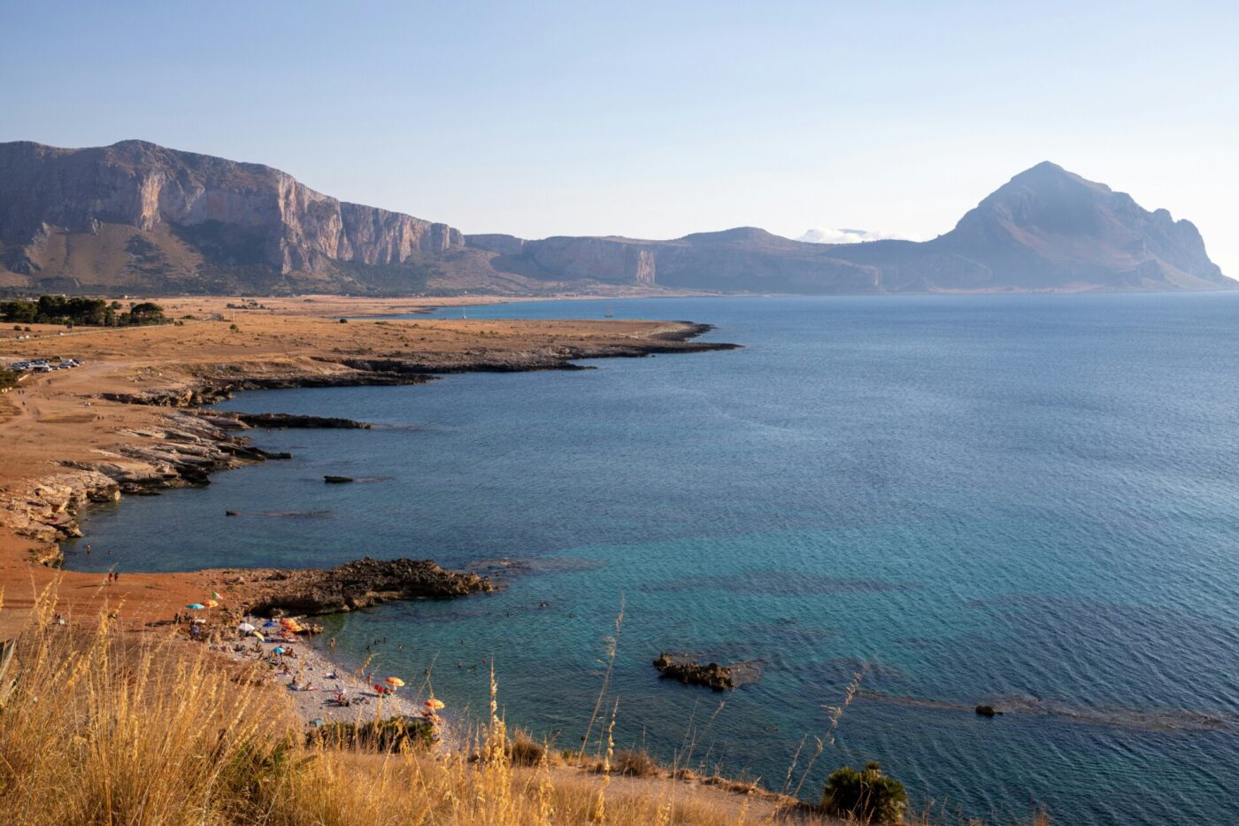 the blue sea with mountains in the backdrop in the province of trapani sicily