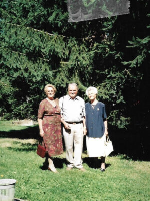 a vintage photo of three Italian siblings who immigrated to France