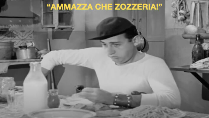 a vintage image of alberto sordi eating with text overlaid that reads "ammazza che zozzeria"