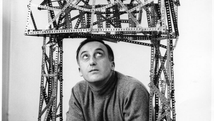 a black and white image of Enrico Baj from 1964