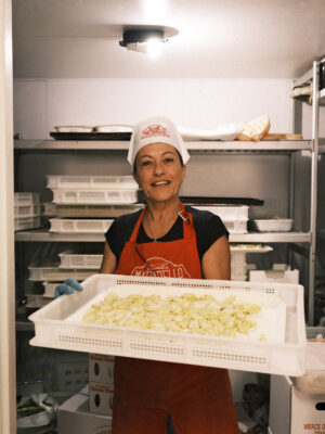 In the kitchen at Il Mattarello making tortelli con la coda