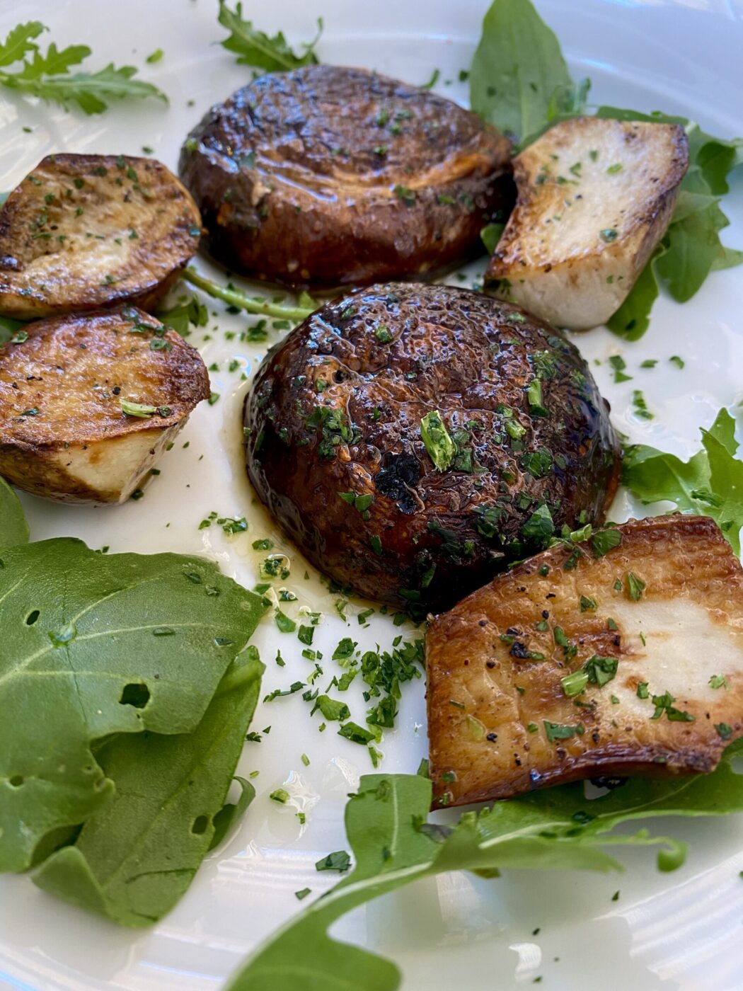 a plate of grilled porcini