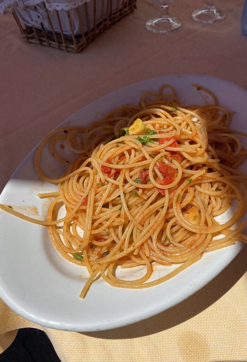 a sunlight plate of pasta puttanesca