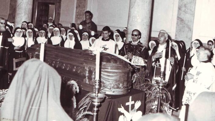 a vintage image of a funeral inside a church