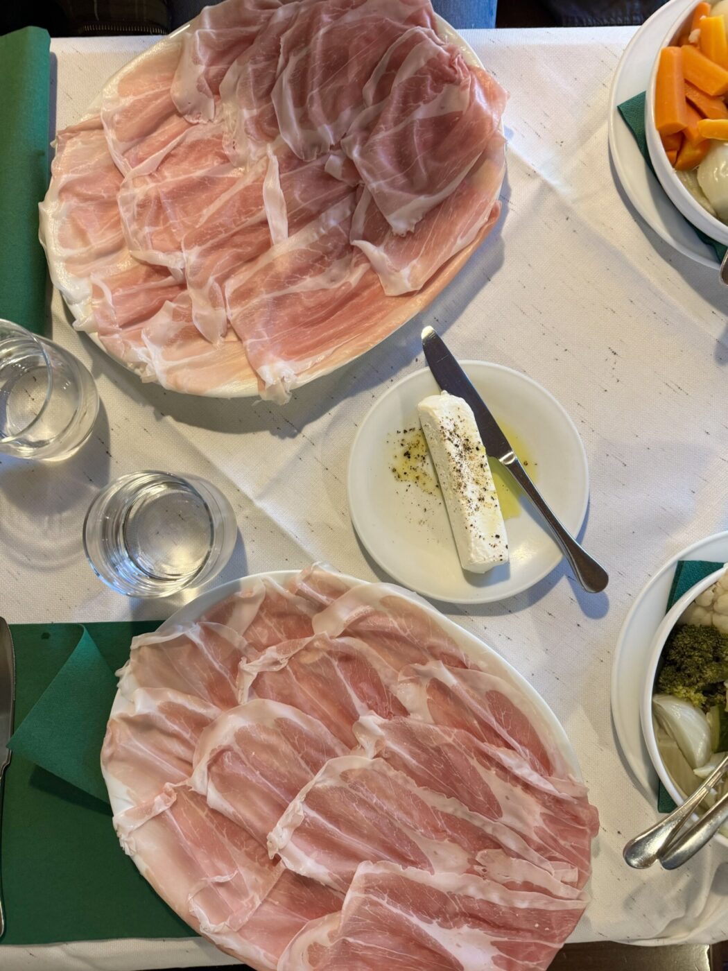 Two platters of Prosciutto di San Daniele DOP