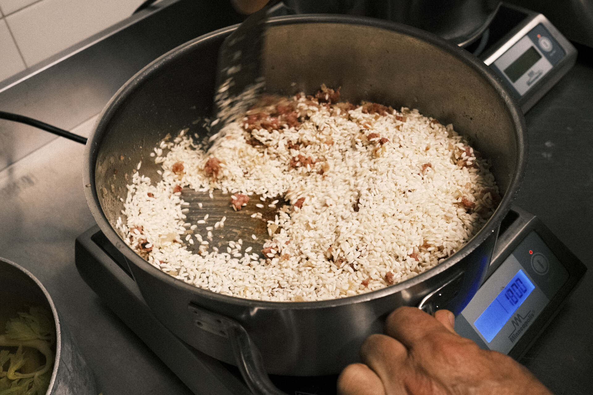 panissa rice cooking in a giant pot