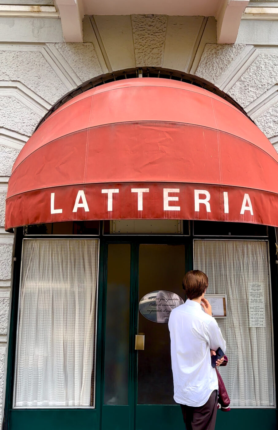 the front awning of latteria in milan