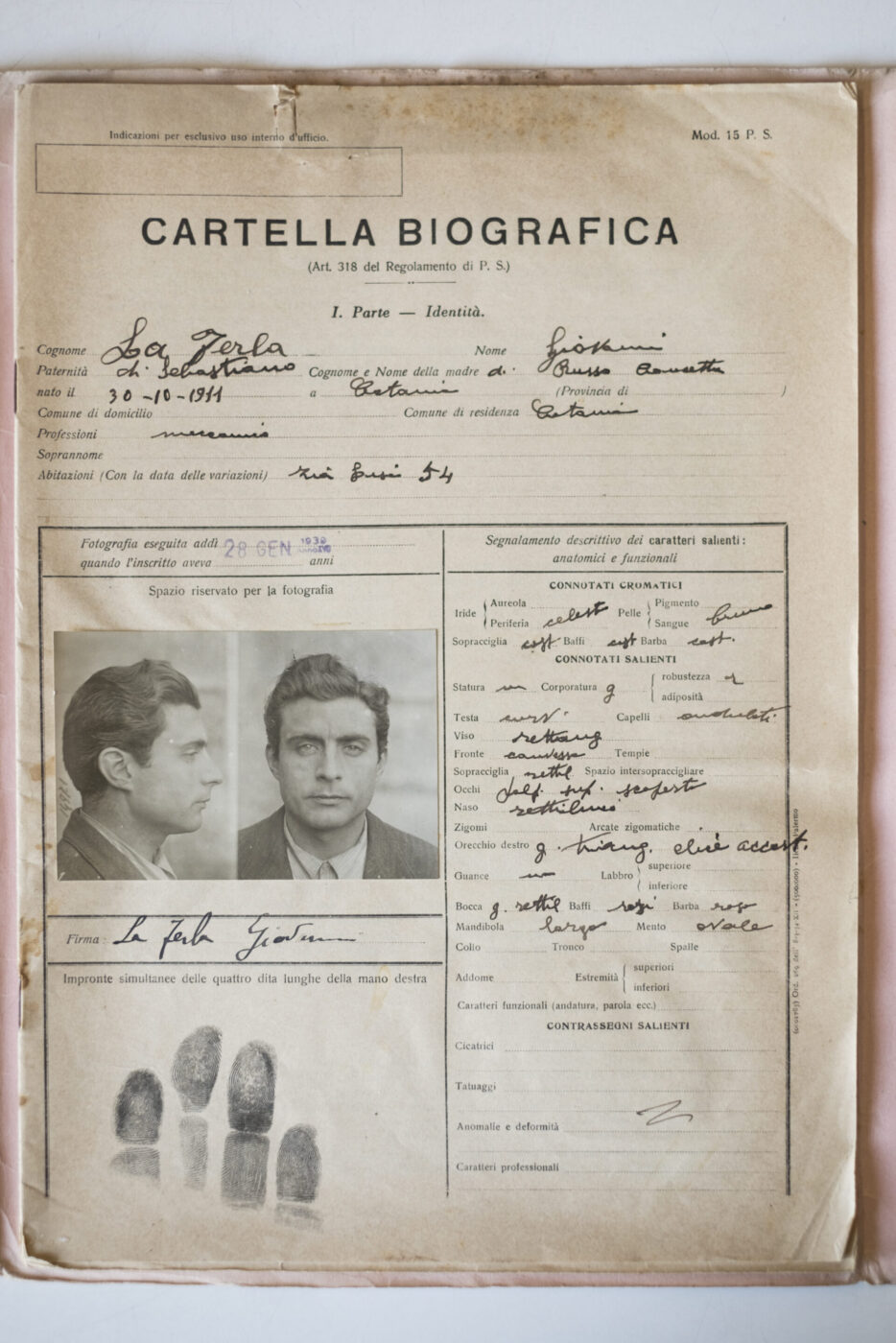 Aged Italian Record Sheet - Vintage biographical sheet with mugshots, handwritten details, fingerprints, stamps; paper is worn.